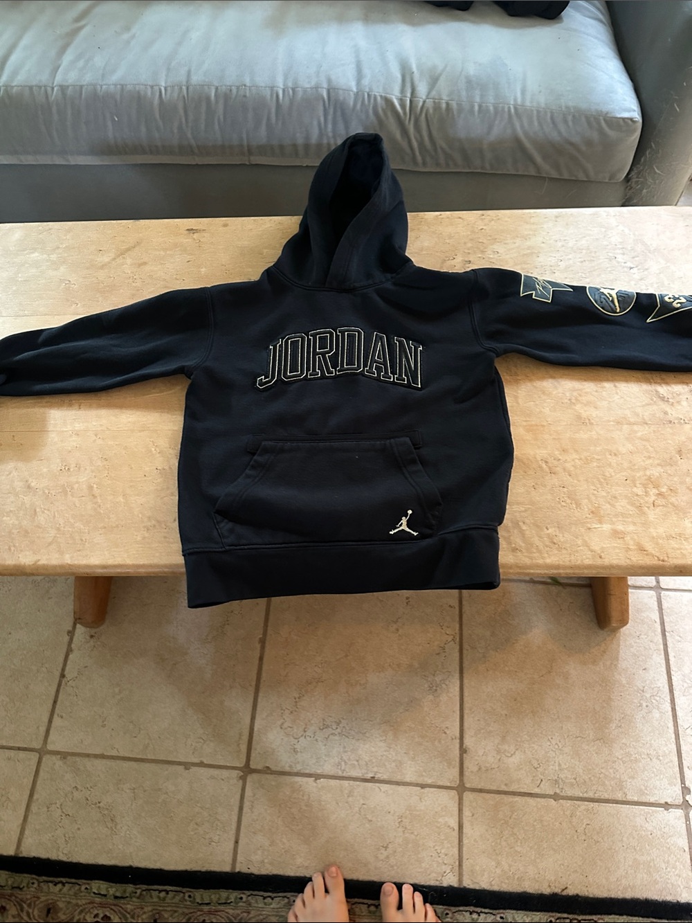 Jordan Black Hoodie with White Jumpman and Gold Sleeve Accents